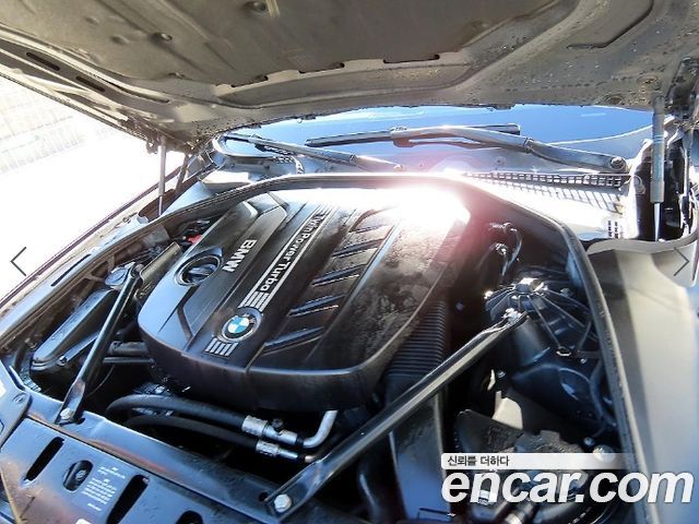 BMW 5-Series 2013 — photo 19