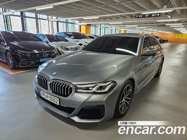 BMW 5-Series 2023 — photo 1