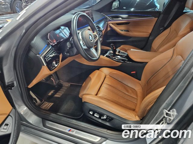 BMW 5-Series 2023 — photo 11