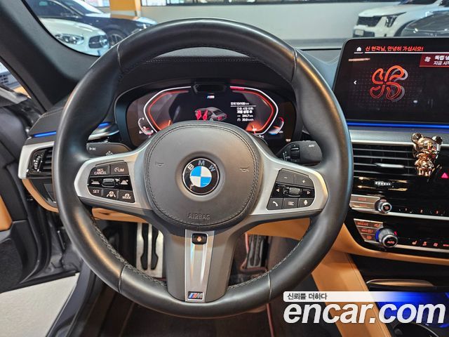 BMW 5-Series 2023 — photo 13
