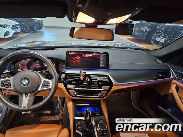 BMW 5-Series 2023 — photo 14