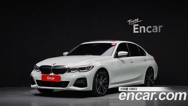 BMW 3-Series 2022 — photo 1