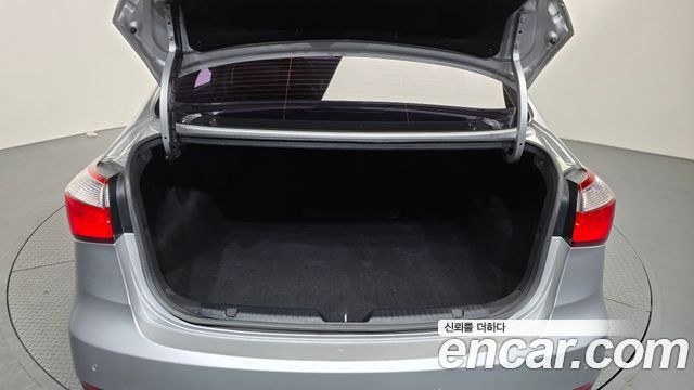 Kia K3 2015 — photo 23