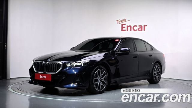 BMW 5-Series 2024 — photo 1