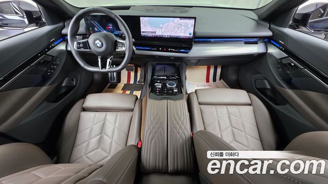 BMW 5-Series 2024 — photo 10