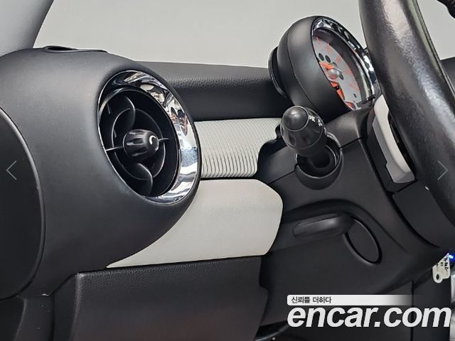 Mini Cooper 2010 — photo 17