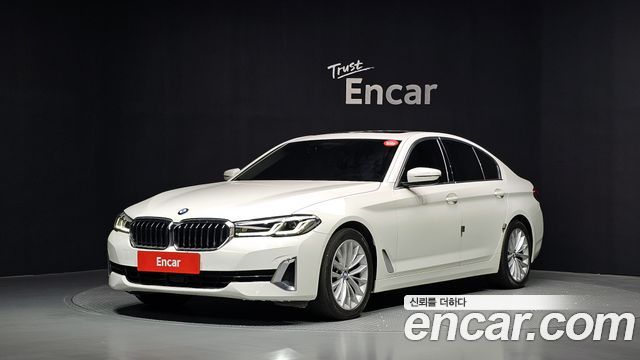 BMW 5-Series 2021 — photo 1