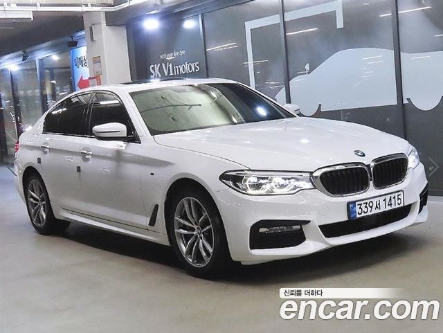 BMW 5-Series 2017 — photo 1