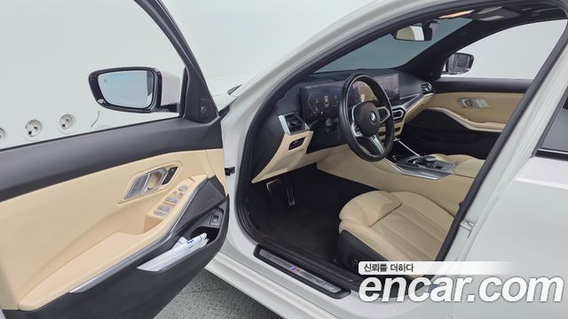 BMW 3-Series 2024 — photo 13