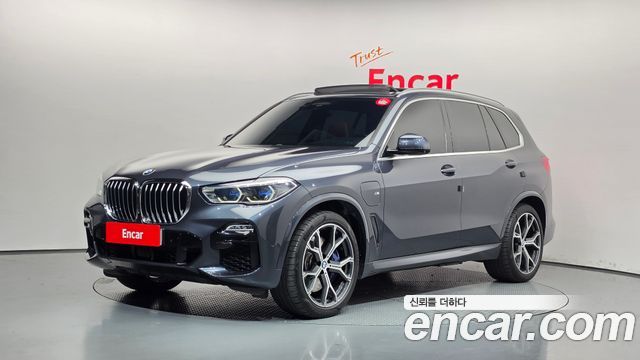 BMW X5 2021 — photo 1