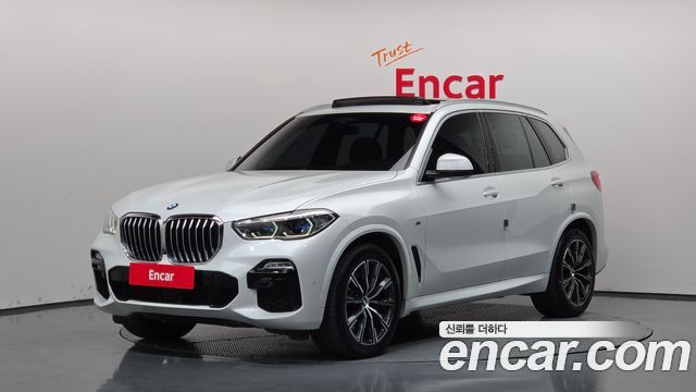 BMW X5 2021 — photo 1
