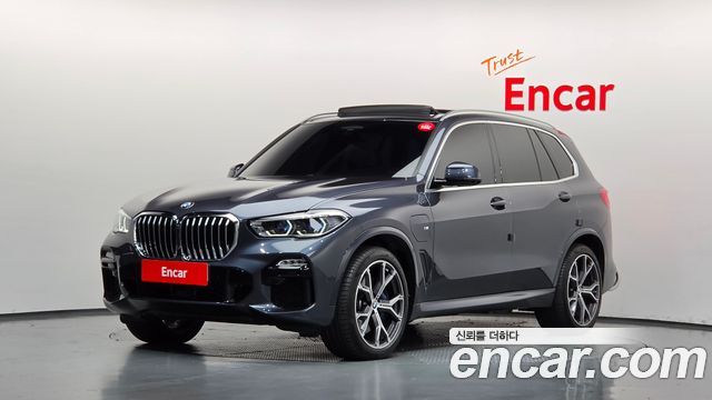 BMW X5 2021 — photo 1