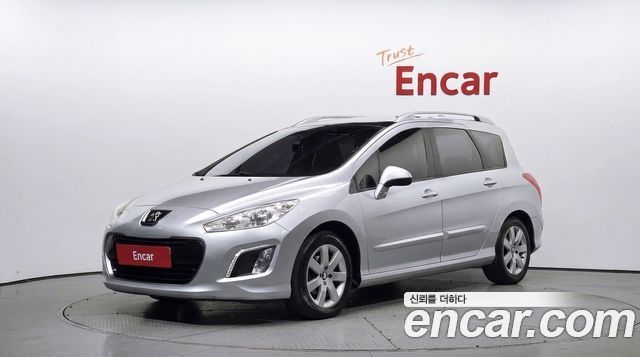 Peugeot 308 2013 — photo 1