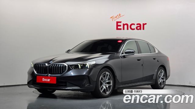 BMW 5-Series 2024 — photo 1