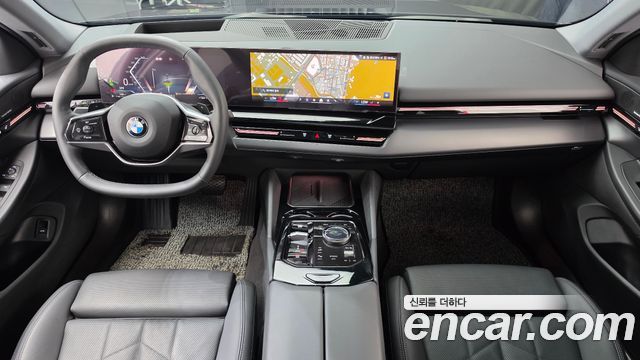 BMW 5-Series 2024 — photo 10