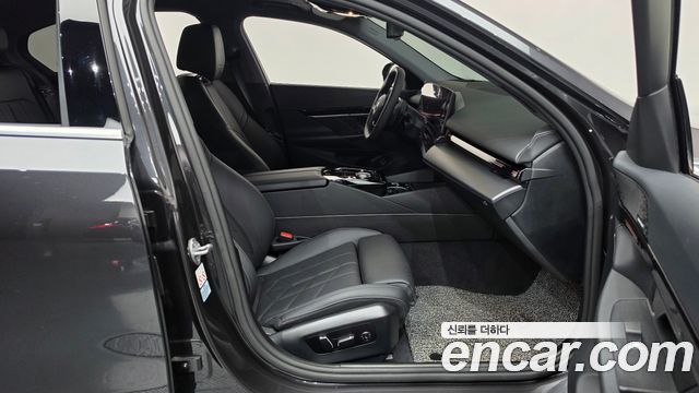 BMW 5-Series 2024 — photo 16