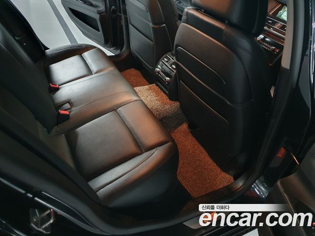BMW 7-Series 2013 — photo 12
