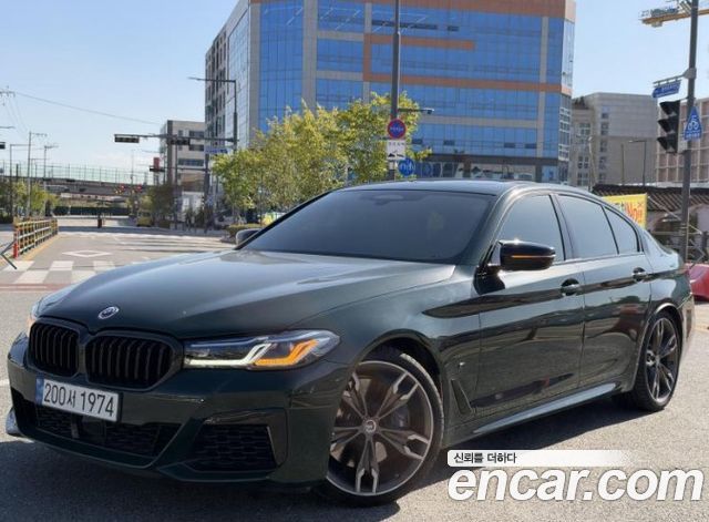BMW 5-Series 2021 — photo 1