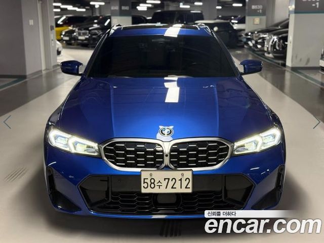 BMW 3-Series 2023 — photo 1