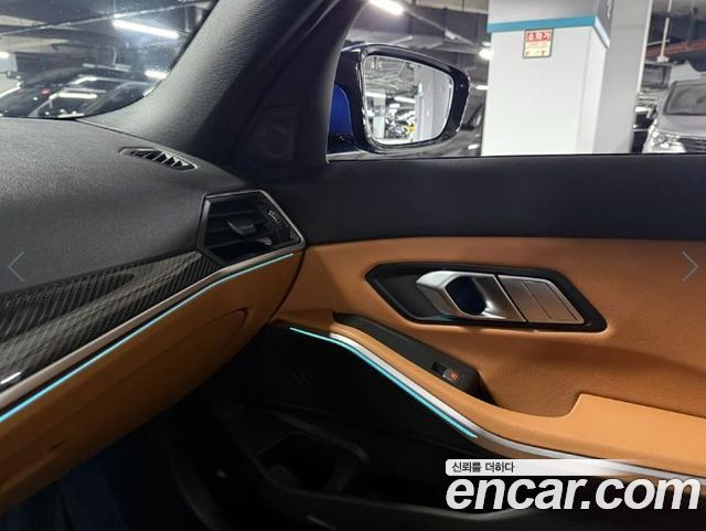 BMW 3-Series 2023 — photo 16