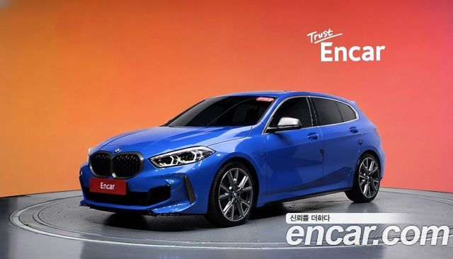 BMW 1-Series 2021 — photo 1