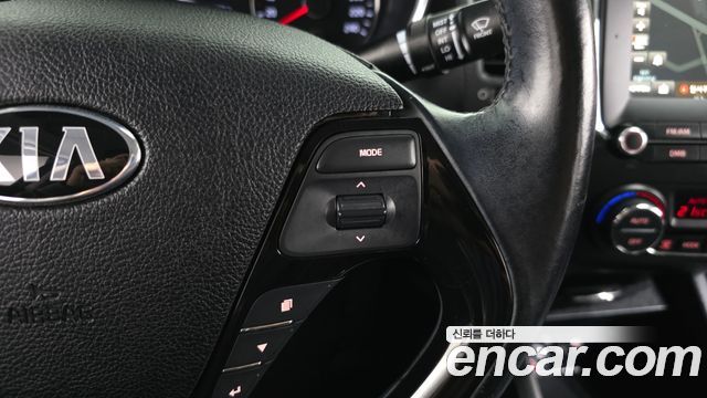 Kia K3 2016 — photo 15