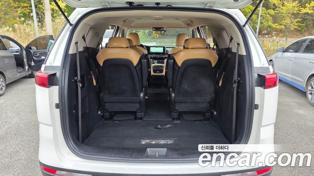 Kia Canival 2023 — photo 23