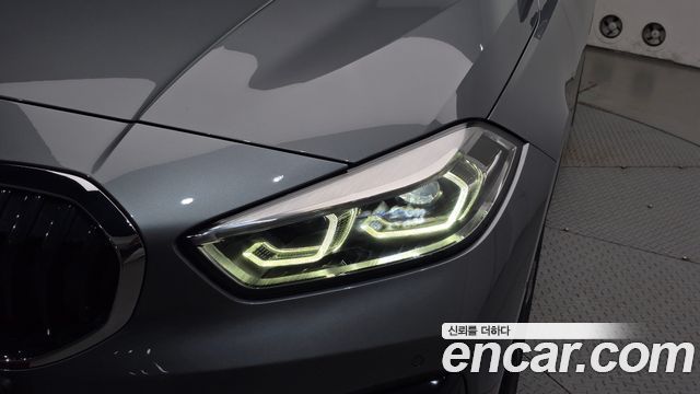 BMW 1-Series 2024 — photo 8