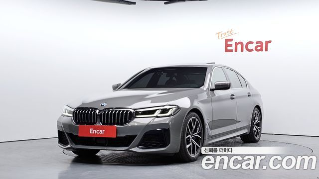 BMW 5-Series 2022 — photo 1