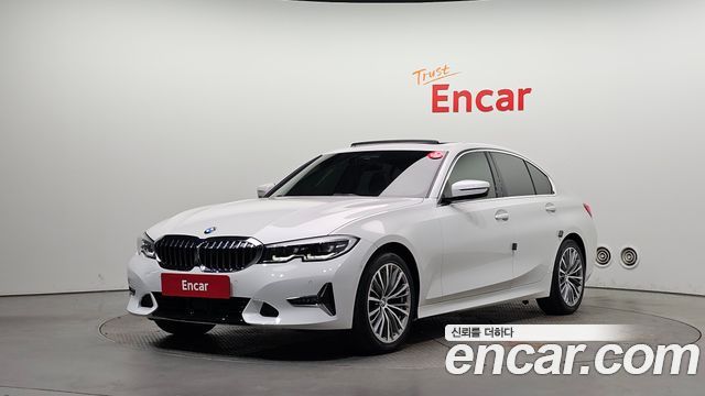 BMW 3-Series 2021 — photo 1