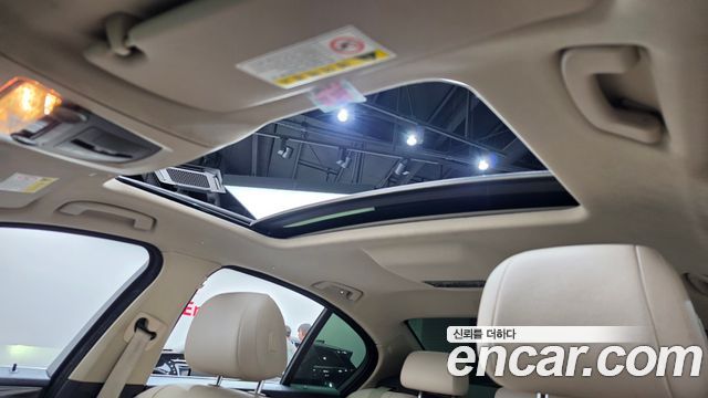 BMW 5-Series 2014 — photo 18