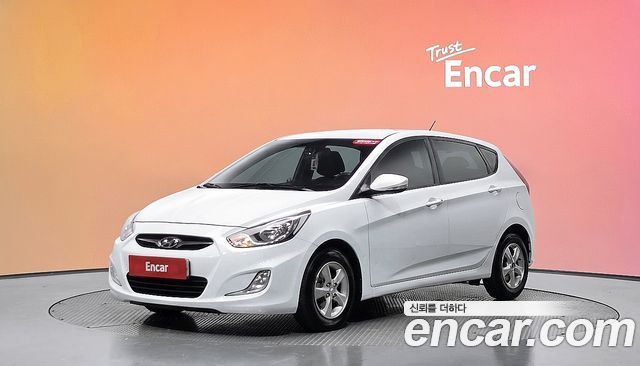 Hyundai Accent 2012 — photo 1