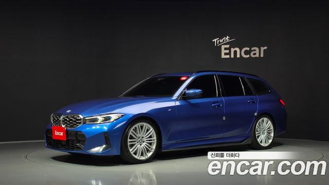 BMW 3-Series 2023 — photo 1