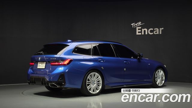 BMW 3-Series 2023 — photo 2