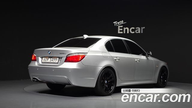 BMW 5-Series 2009 — photo 2