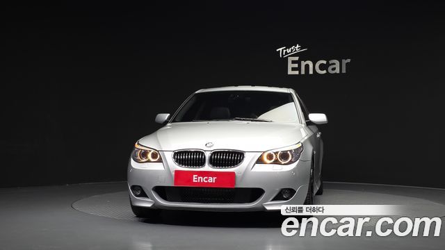 BMW 5-Series 2009 — photo 3