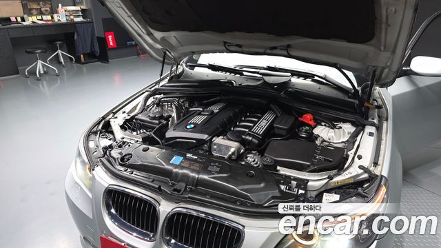 BMW 5-Series 2009 — photo 6