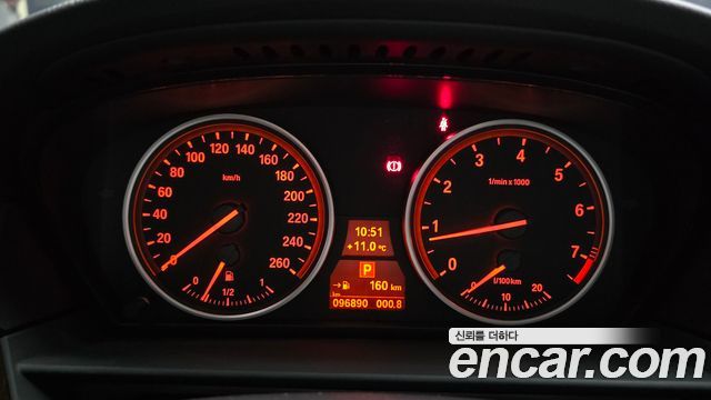 BMW 5-Series 2009 — photo 11
