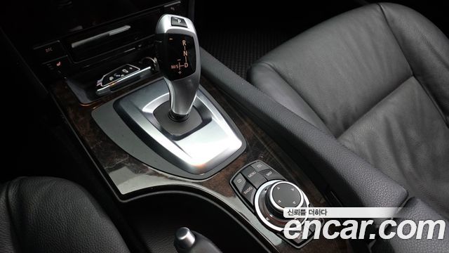 BMW 5-Series 2009 — photo 12