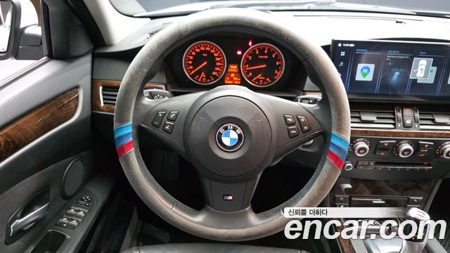 BMW 5-Series 2009 — photo 19