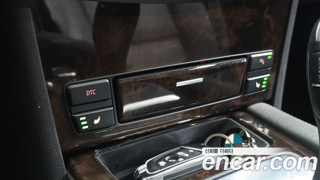 BMW 5-Series 2009 — photo 24