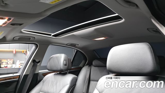BMW 5-Series 2009 — photo 25