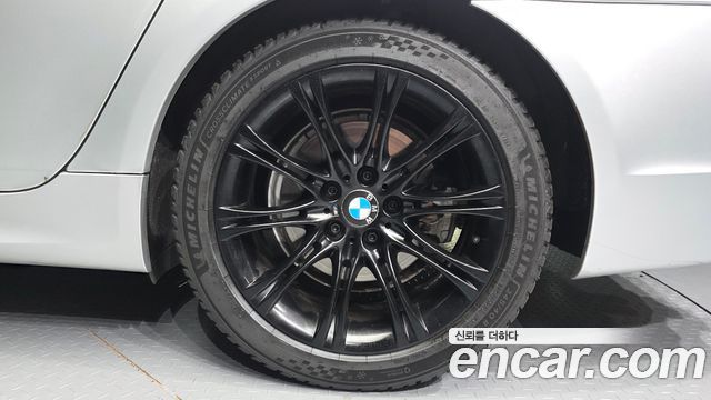 BMW 5-Series 2009 — photo 7