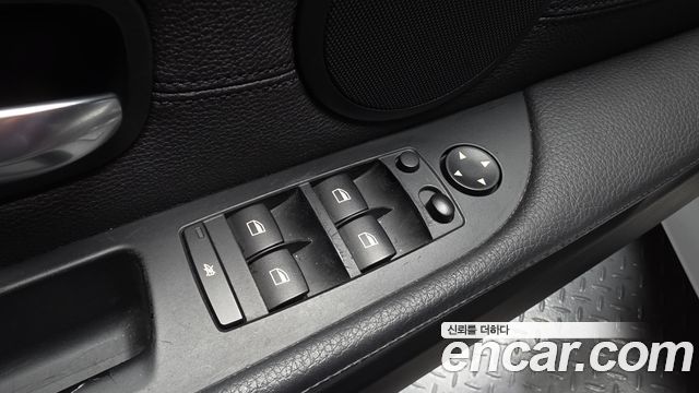 BMW 5-Series 2009 — photo 29