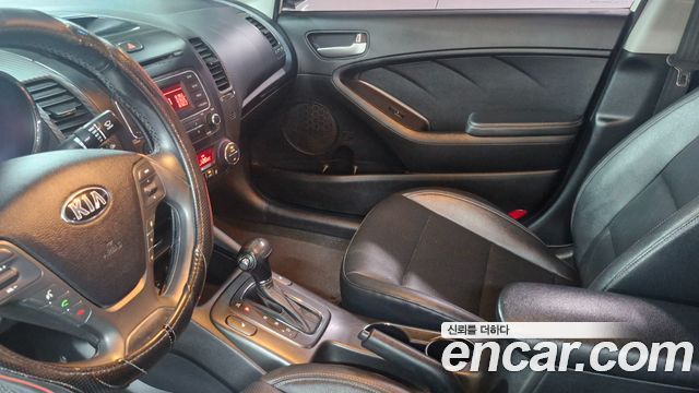 Kia K3 2013 — photo 8