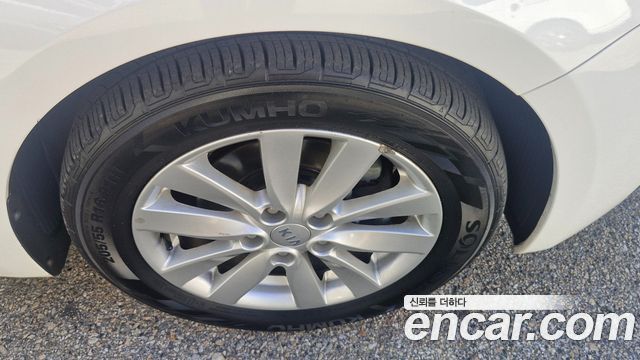 Kia K3 2013 — photo 17
