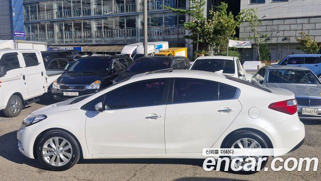 Kia K3 2013 — photo 20