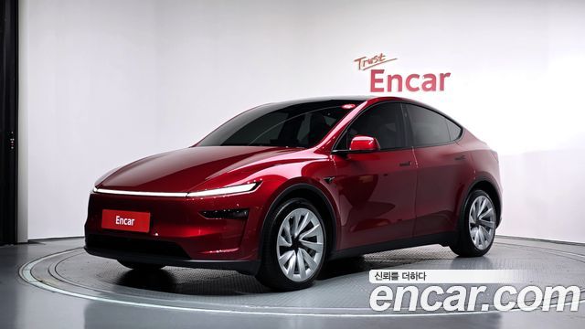 Tesla Model Y 2025 — photo 1