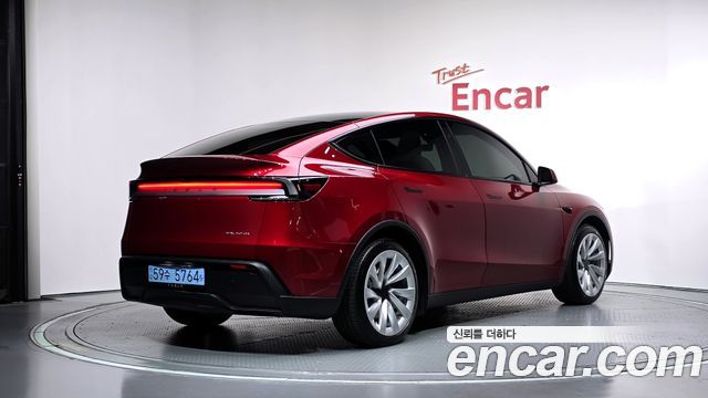 Tesla Model Y 2025 — photo 2