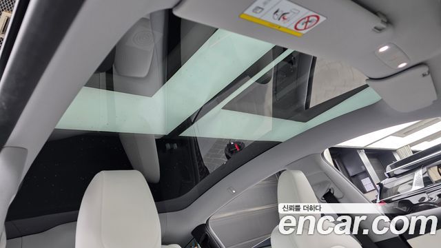 Tesla Model Y 2025 — photo 17